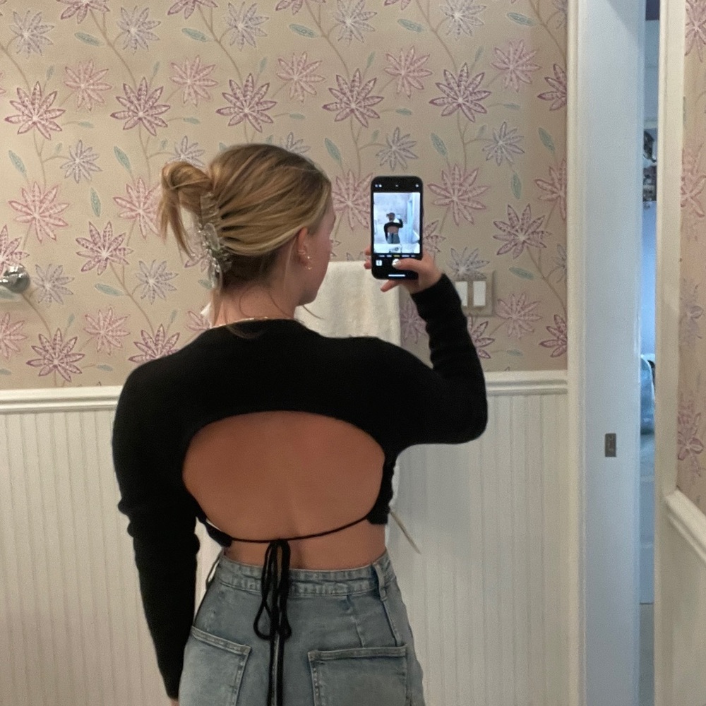 Open back black fuzzy sweater